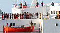 Image 58The crew of the merchant vessel Faina stand on the deck after a U.S. Navy request to check on their health and welfare. The Belize-flagged cargo ship owned and operated by Kaalbye Shipping, Ukraine, was seized by pirates 25 September 2008 and forced to proceed to anchorage off the Somali Coast. The ship is carrying a cargo of Ukrainian T-72 tanks and related military equipment. (from Piracy off the coast of Somalia)