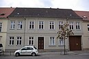 Wohnhaus mit Seitenflügel