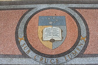 University shield near library