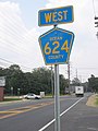 Signage for CR 624 heading westbound on Drum Point Road, the signage is of the newer kind