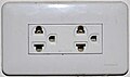 Thai socket which also accepts Type A, B and C plugs.