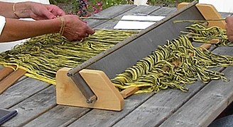 Sleying a reed with coarser yarn