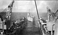 LSM-175 about to enter the well of USS Carter Hall (LSD-3) in San Diego Bay, Spring 1951