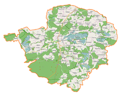 Mapa konturowa powiatu milickiego, u góry po prawej znajduje się punkt z opisem „Wodników Górny”