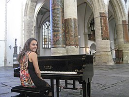 Christiana Bohorquez tijdens de opname van een videoclip in de Grote of Sint-Bavokerk, Haarlem, februari 2014.