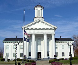 Madison County courthouse, Richmond, with flags at half-staff in honor of Veterans Day (2007).