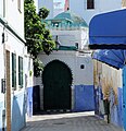 Street and marabout's tomb in the medina.