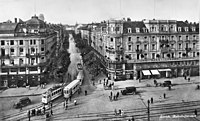 Eingang zur Bahnhofstrasse mit Bahnhofplatz 6 auf der linken Seite und Hotel Schweizerhof auf der rechten Seite