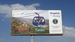 A billboard advertising the tramway near Goris