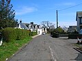 The mainstreet with the site of the old school on the right