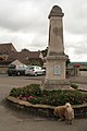 War memorial, with a message from Charles De Gaulle.