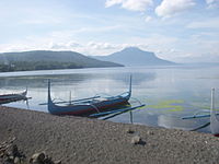 Fishing boats on the shore of Taal Lake