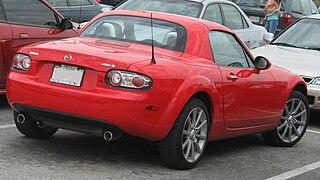 Mazda Miata Power Retractable Hard Top (PRHT) c. 2007, with 77 lb (35 kg) polycarbonate hardtop and identical cargo capacity to the soft top version[15]