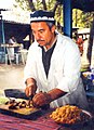 Image 9A man makes plov, the national dish of Tajikistan. (from Culture of Tajikistan)