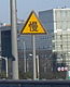 China: generic caution with "slow down" text.