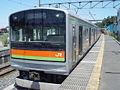 Isang seryeng 205-3000 EMU sa Estasyon ng Musashi-Takahagi, Hunyo 2004