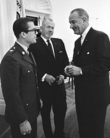 Steinbeck (center), with his son, visits President Lyndon B. Johnson