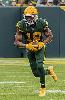 Cobb running with the football during a game