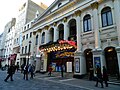 Image 48Music hall evolved into variety shows. First performed in 1912, the Royal Variety Performance was first held at the London Palladium (pictured) in 1941. Performed in front of members of the Royal Family, it is held annually in December and broadcast on television. (from Culture of the United Kingdom)