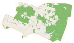 Mapa konturowa gminy Adamówka, u góry nieco na prawo znajduje się punkt z opisem „Parafiaśw. Mikołaja Biskupaw Majdanie Sieniawskim”