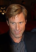 Aaron Eckhart (Procureur Harvey Dent / Double-Face)