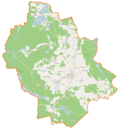 Mapa konturowa gminy Brusy, blisko centrum na prawo znajduje się punkt z opisem „Brusy”