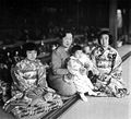 Princess Takako being held by her mother, Empress Nagako during the festivities for the Girls' Day, c. 1940