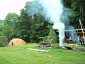 Finished pile with windbreak, charcoal burner’s hut and fireplace