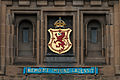 Inscription above the gate of Edinburgh Castle "Nemo me impune lacessit" - No one "cuts" (attacks) me with impunity. Nemo me impune lacessit is the Latin motto of the Order of the Thistle and of three Scottish regiments of the British Army. Edinburgh. June 2014.