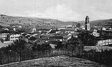 A black and white postcards showing the town.