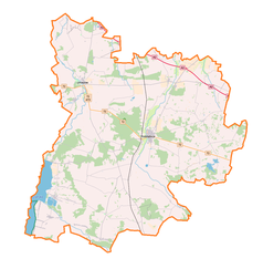 Mapa konturowa powiatu poddębickiego, u góry po prawej znajduje się punkt z opisem „Parądzice”