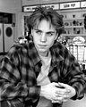 Image 26Jonathan Brandis in a Grunge-style flannel shirt and curtained hair in 1993 (from 1990s in fashion)