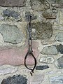 Jougs on the perimeter wall of Duddingston Kirk, near Edinburgh