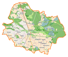 Mapa konturowa gminy Żmigród, u góry znajduje się punkt z opisem „Czarny Las”