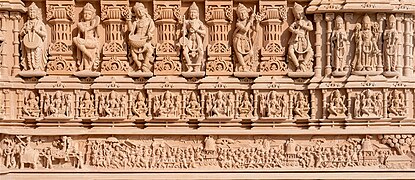 Exterior wall carvings depicting the Ratha Yatra festival of Jagannath in Odisha