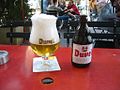 Een flesje en een glas van Duvel