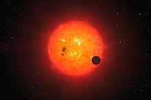 The newly discovered super-Earth surrounding the nearby star GJ 1214.