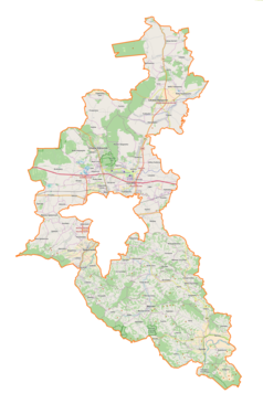 Mapa konturowa powiatu rzeszowskiego, blisko centrum na dole znajduje się punkt z opisem „Tyczyn”