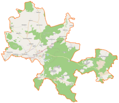 Mapa konturowa gminy Sianów, blisko centrum u góry znajduje się punkt z opisem „Jodły Karnieszewickie”