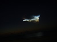 The noctilucent cloud[46] in this photograph was created by the exhaust gas from the Delta II 7925 rocket used to launch Phoenix.