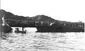 The crew of the US PT boat PT 59 inspects the wreckage of the Japanes submarine I-1