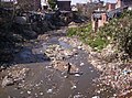 Image 16Poverty often leads to unhygienic living conditions, as in this community in the Indian Himalayas. Such conditions promote contraction of diarrheal diseases, as a result of contaminated drinking water, poor sanitation and hygiene. (from Drinking water)