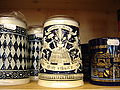 An ornate stoneware beer stein