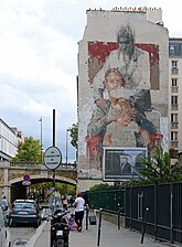 Franchissement de la rue par celle de Tolbiac (arche subsistante du viaduc de Tolbiac).