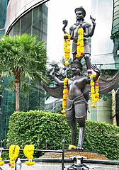 A statue in Bangkok depicting Vishnu on his vahana Garuda, the eagle. One of the oldest discovered Hindu-style statues of Vishnu in Thailand is from Wat Sala Tung in Surat Thani Province and has been dated to ~400 CE.[161]