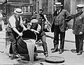 Image 24Prohibition agents emptying barrels of alcohol (from 1920s)