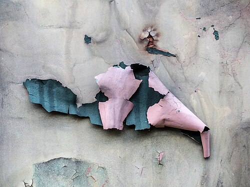 Peeling paint on an old railroad car