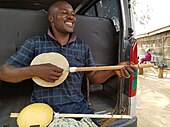 Niger and northern Nigeria. Fulani musician playing a gourd bodied garaya. The Hausa also make the instrument, with a wood body.[136]