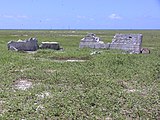 Settlement remains, radio mast in the background