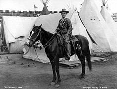 Calamity Jane on horseback, astride